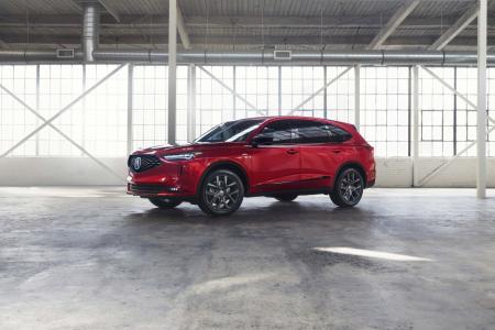 red suv in garage